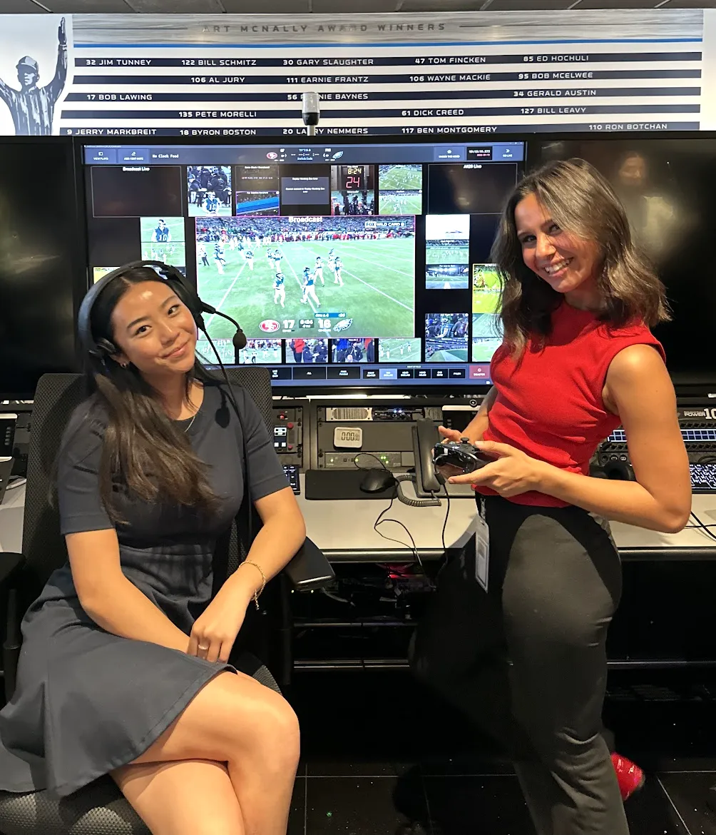 in the broadcast control room with a colleague